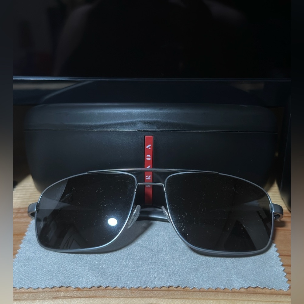 Versace shoes,sunglasses and shoes/ coach bags and clothes and Prada sunglasses